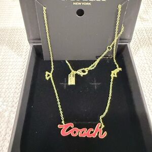 Coach Red And Gold Tone Script Necklace, style #CB396